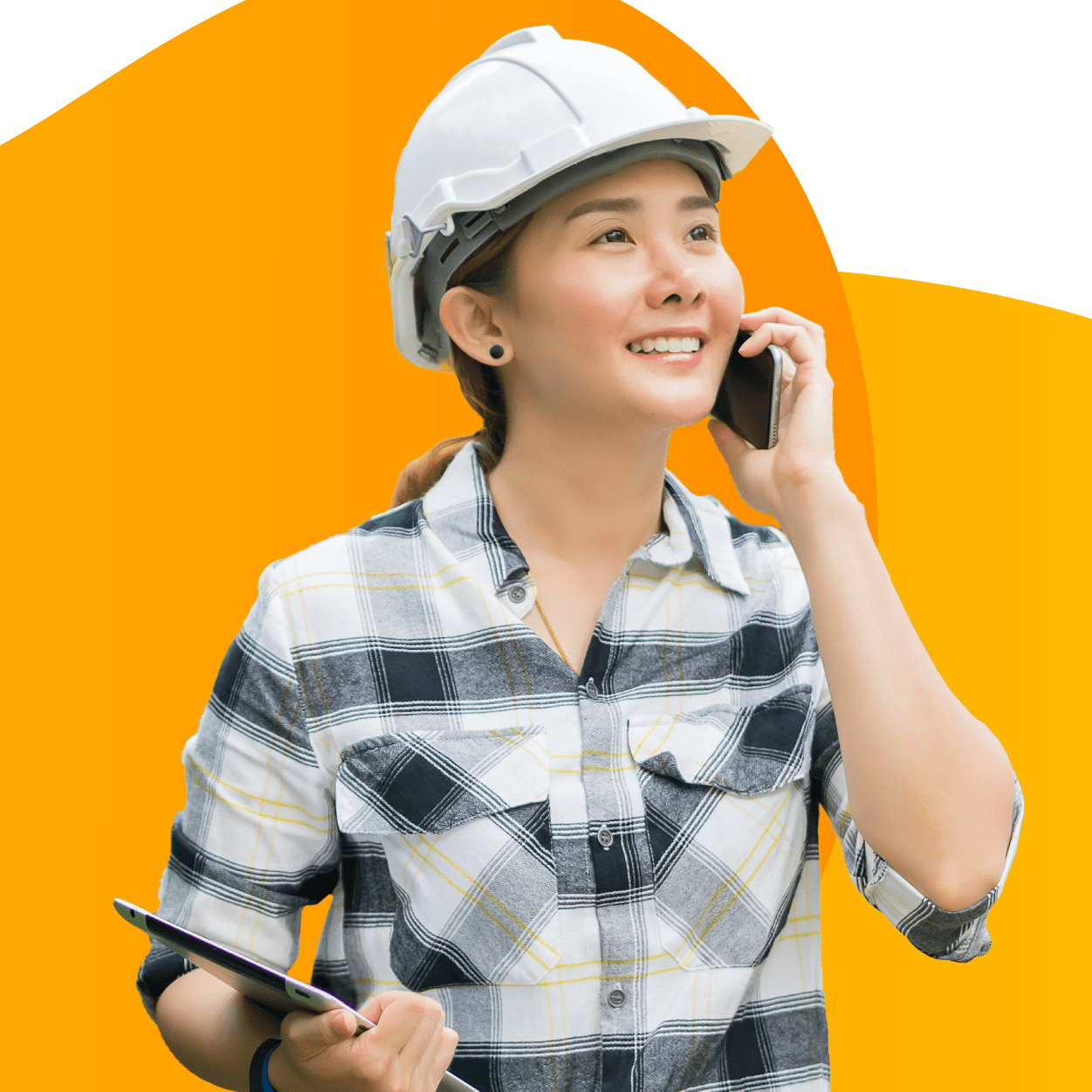 A landscaping designer speaking with a client on their phone.