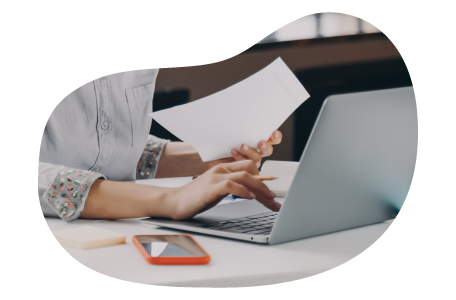 The owner of an advertising agency calculating insurance costs. The owner of an advertising agency calculating insurance costs.