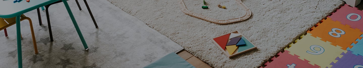 Childcare center play room with toys. Childcare center play room with toys.