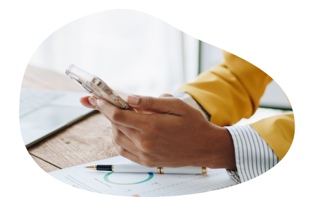 A photographer calculates the cost of business insurance. A photographer calculates the cost of business insurance.