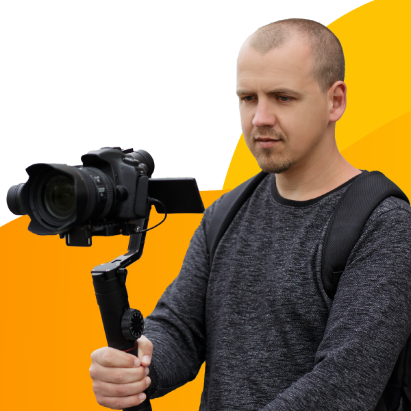 A production studio owner captures video footage for a project