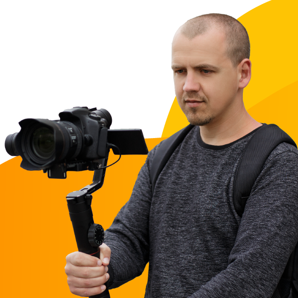 A production studio owner captures video footage for a project