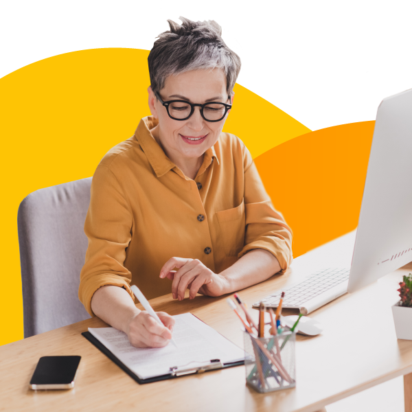 A claims adjuster taking notes while reviewing an insurance claim