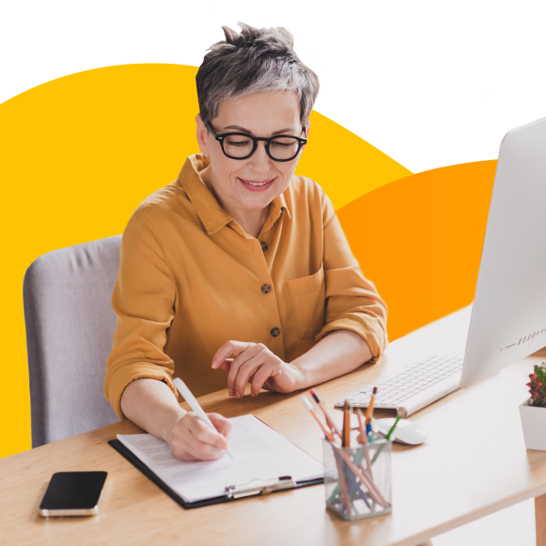 A claims adjuster taking notes while reviewing an insurance claim