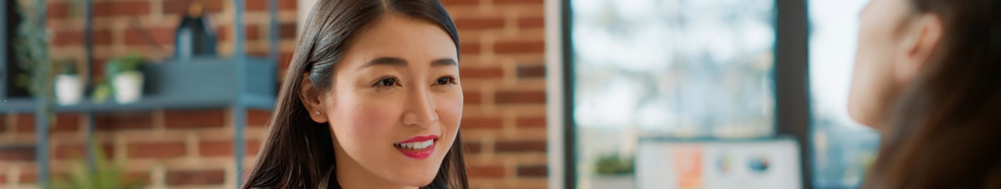 A recruiter meeting with a client to discuss recent job openings A recruiter meeting with a client to discuss recent job openings