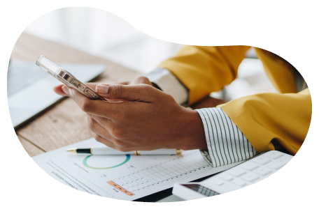 A real estate agent calculating insurance costs. A real estate agent calculating insurance costs.