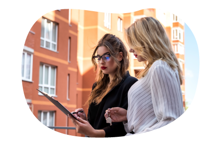 A property manager goes over a lease agreement with a new tenant.