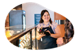 An employee at a cannabis dispensary chats with a customer.
