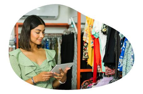 Clothing store owner taking inventory.