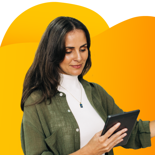 Woman browsing a clothing store catalogue.