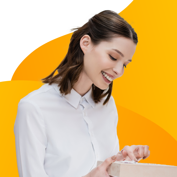 A jewelry store clerk inventorying products.