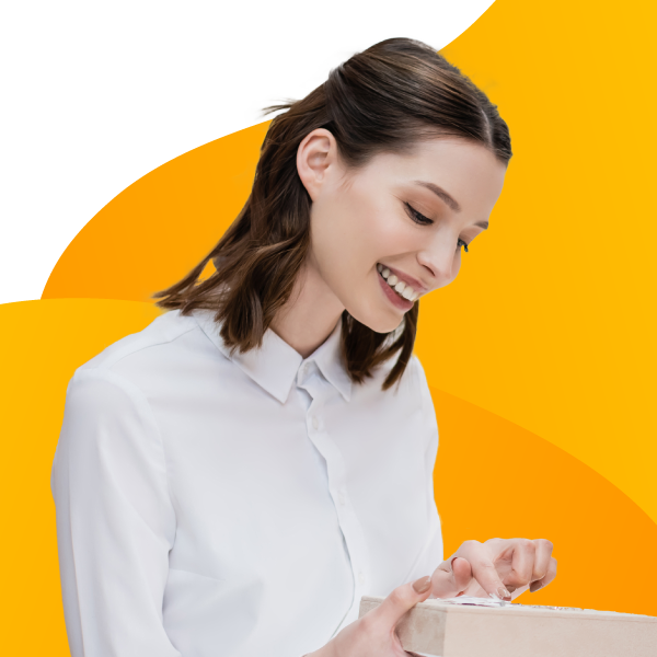 A jewelry store clerk inventorying products.