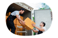 Moving company employees unloading a truck at a new home.
