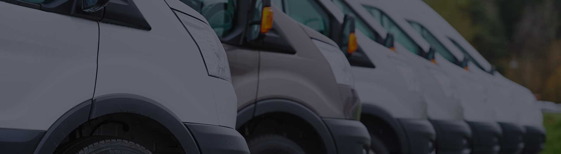 Commercial delivery vans in a row. Commercial delivery vans in a row.