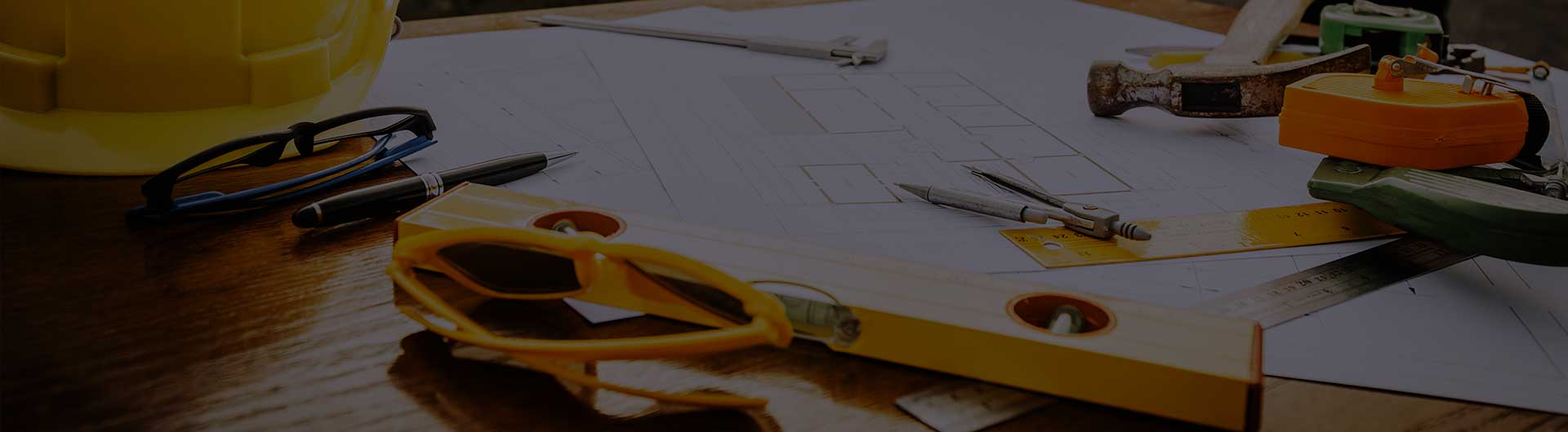 Contractors with a table of tools. Contractors with a table of tools.