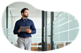 A human resources rep walking through the office of a small business.