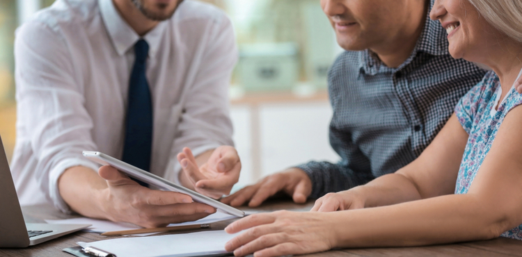 Insurance agent explaining policies to customer