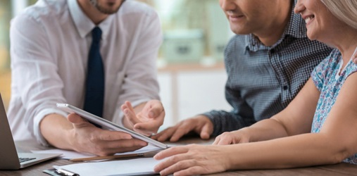 Insurance agent explaining policies to customer