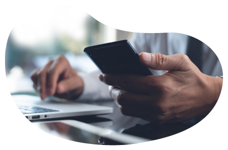A small business owner calculating the cost of general liability insurance. A small business owner calculating the cost of general liability insurance.