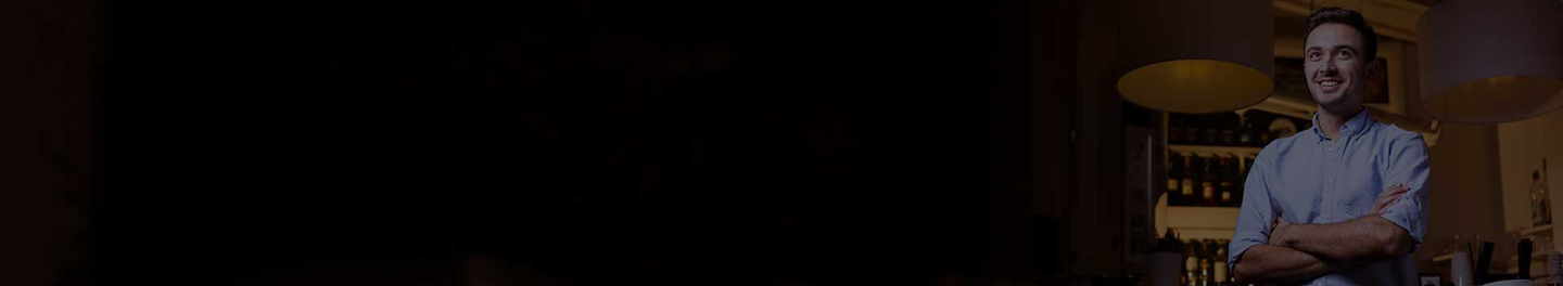 A small business owner reviewing their alcoholic beverage inventory 