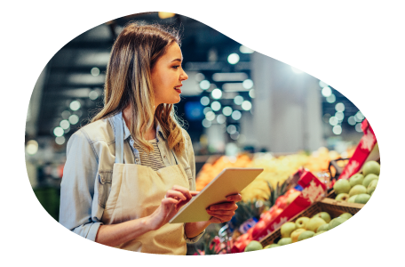 The owner of a grocery store examines their inventory.