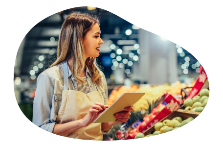 The owner of a grocery store examines their inventory. The owner of a grocery store examines their inventory.