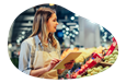 The owner of a grocery store examines their inventory.