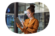 A small business owner reviewing their commercial umbrella policy on a tablet.